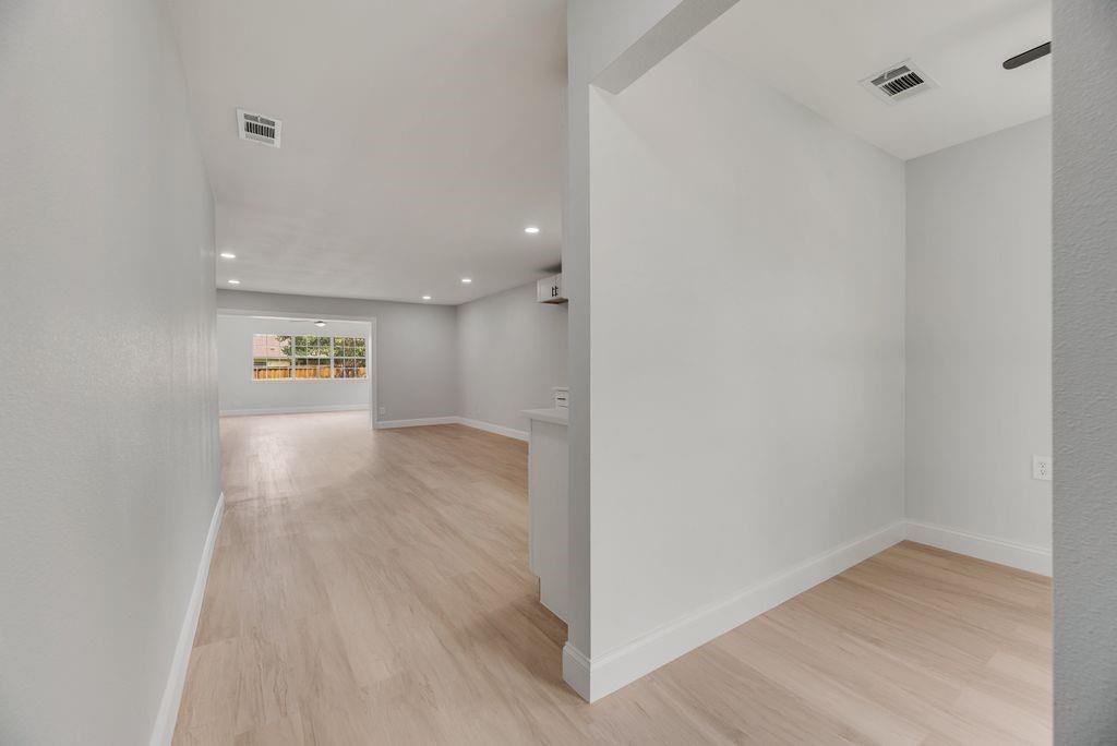 2015 Rose Hill Road Carrollton, TX 75007 - Photo 2 of 19 a view of empty room with wooden floor