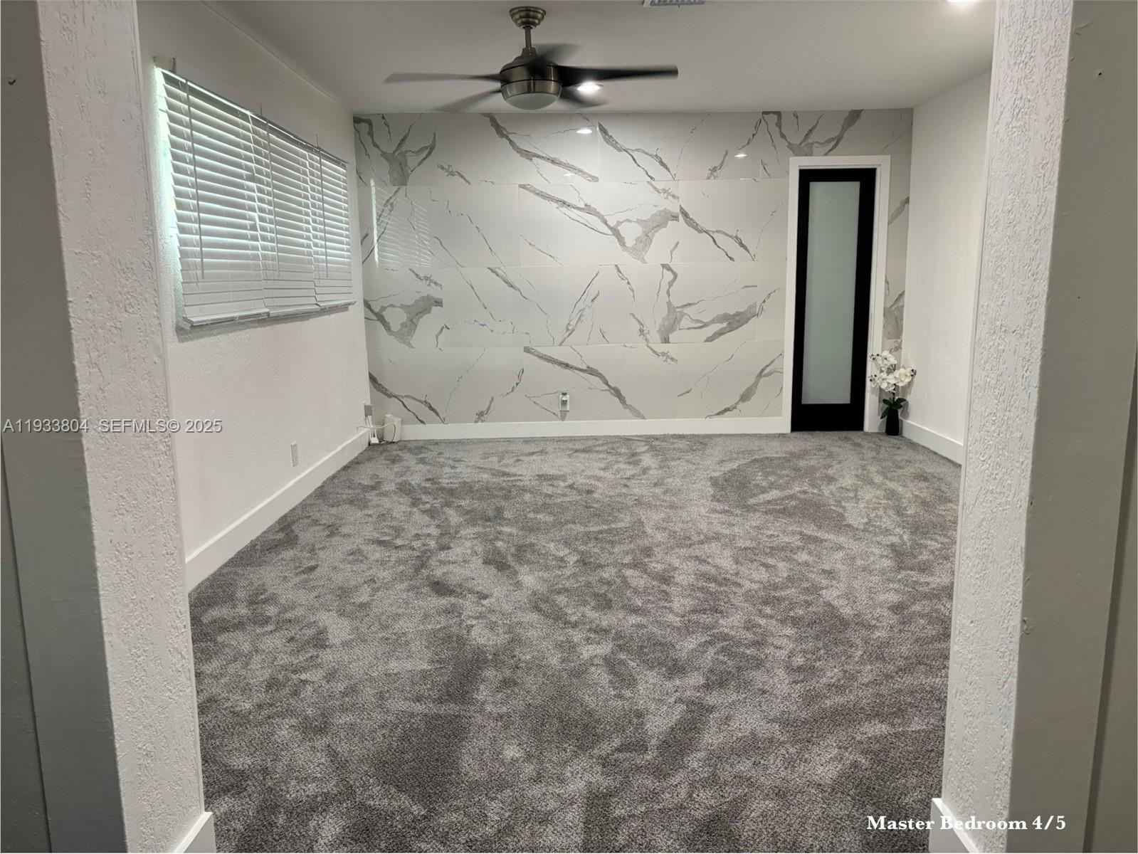 607 Maple Drive Margate, FL 33063 - Photo 12 of 37 a view of a door in the house