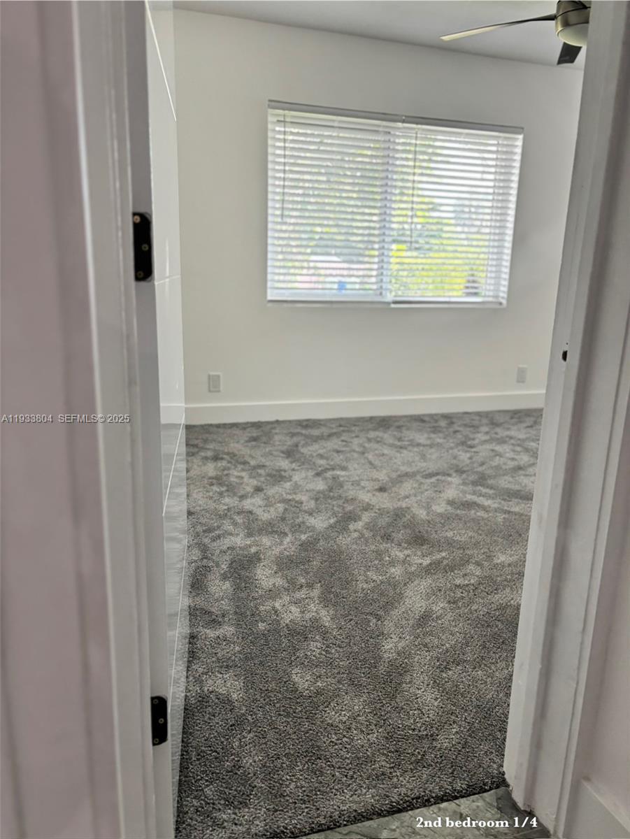 607 Maple Drive Margate, FL 33063 - Photo 16 of 37 a bathroom with a shower