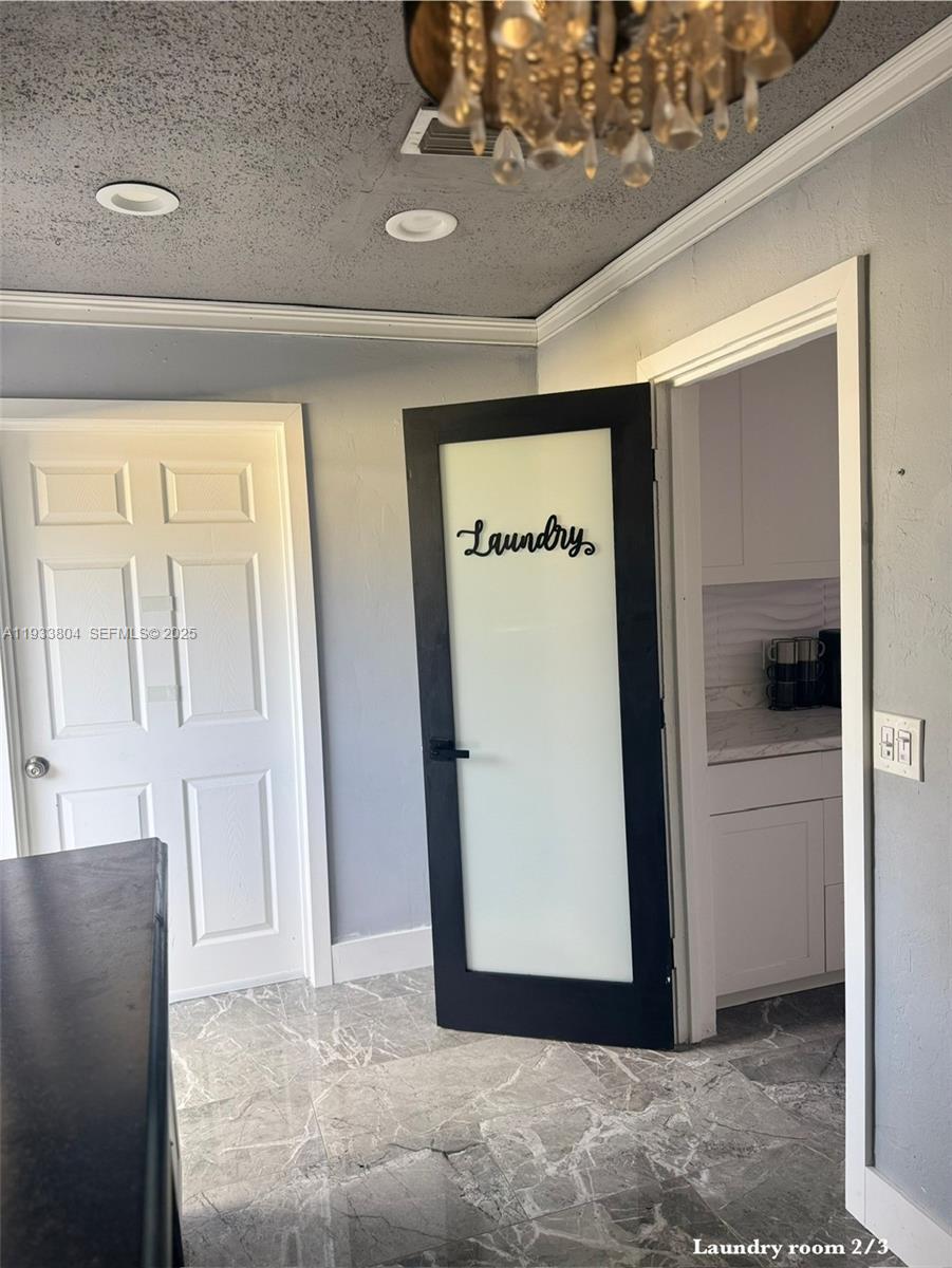 607 Maple Drive Margate, FL 33063 - Photo 30 of 37 a view of a storage in a room