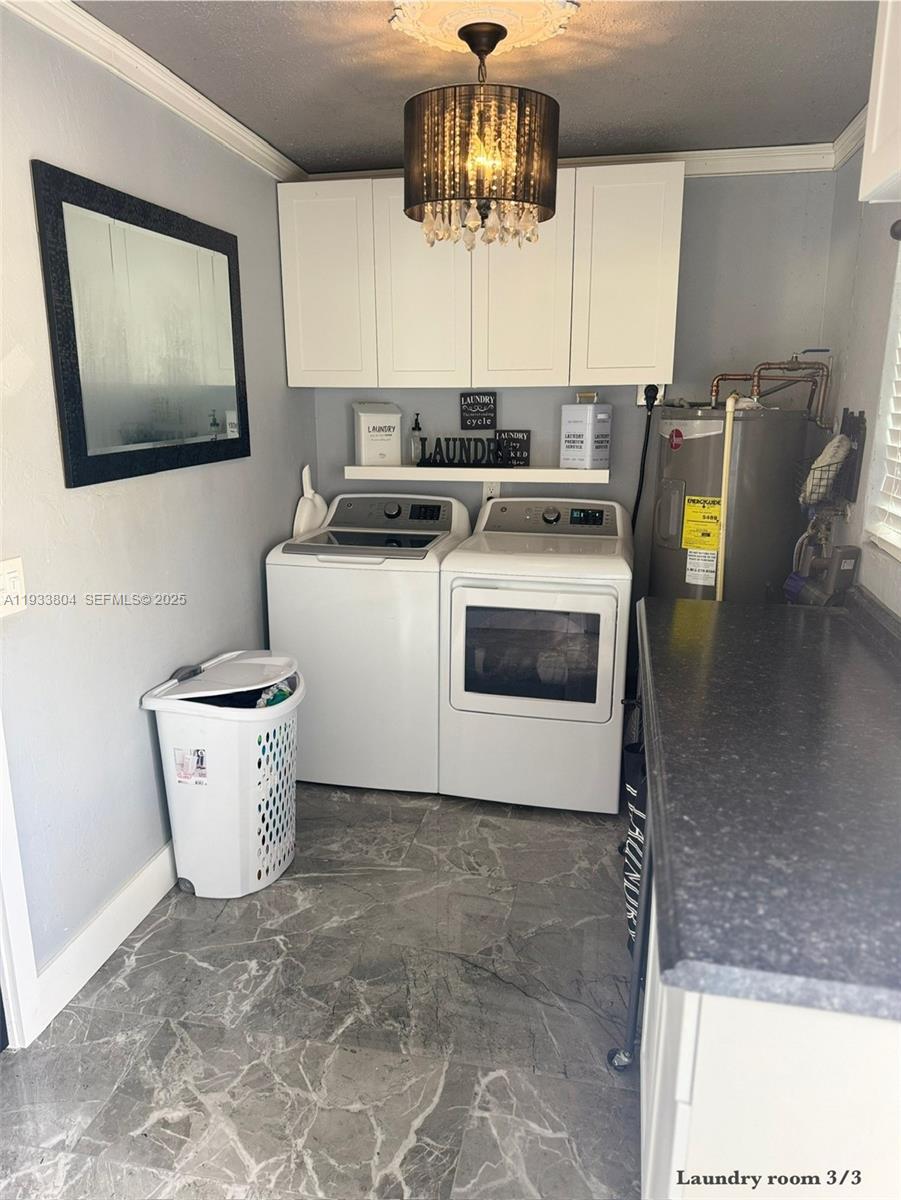 607 Maple Drive Margate, FL 33063 - Photo 31 of 37 a kitchen with a stove a sink and a refrigerator