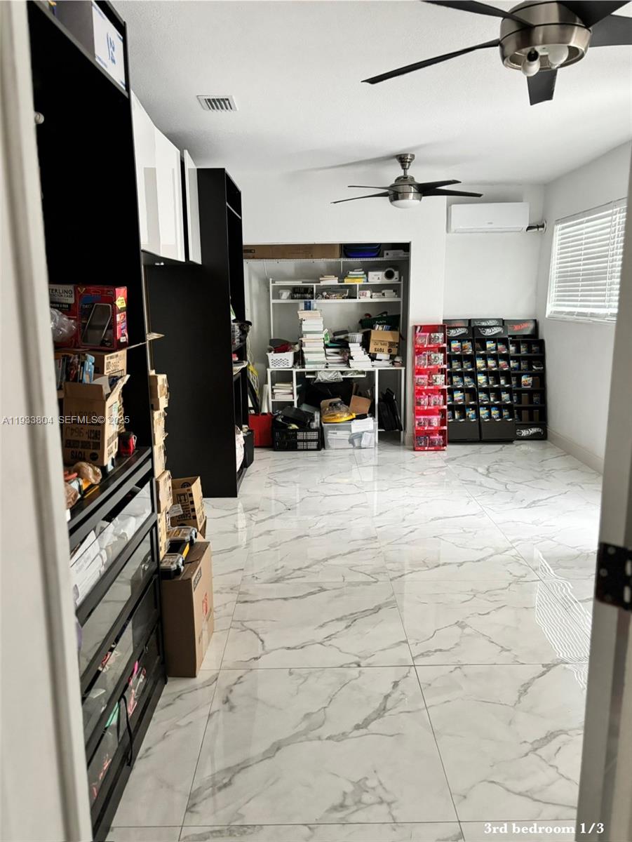 607 Maple Drive Margate, FL 33063 - Photo 34 of 37 a view of a storage & utility room