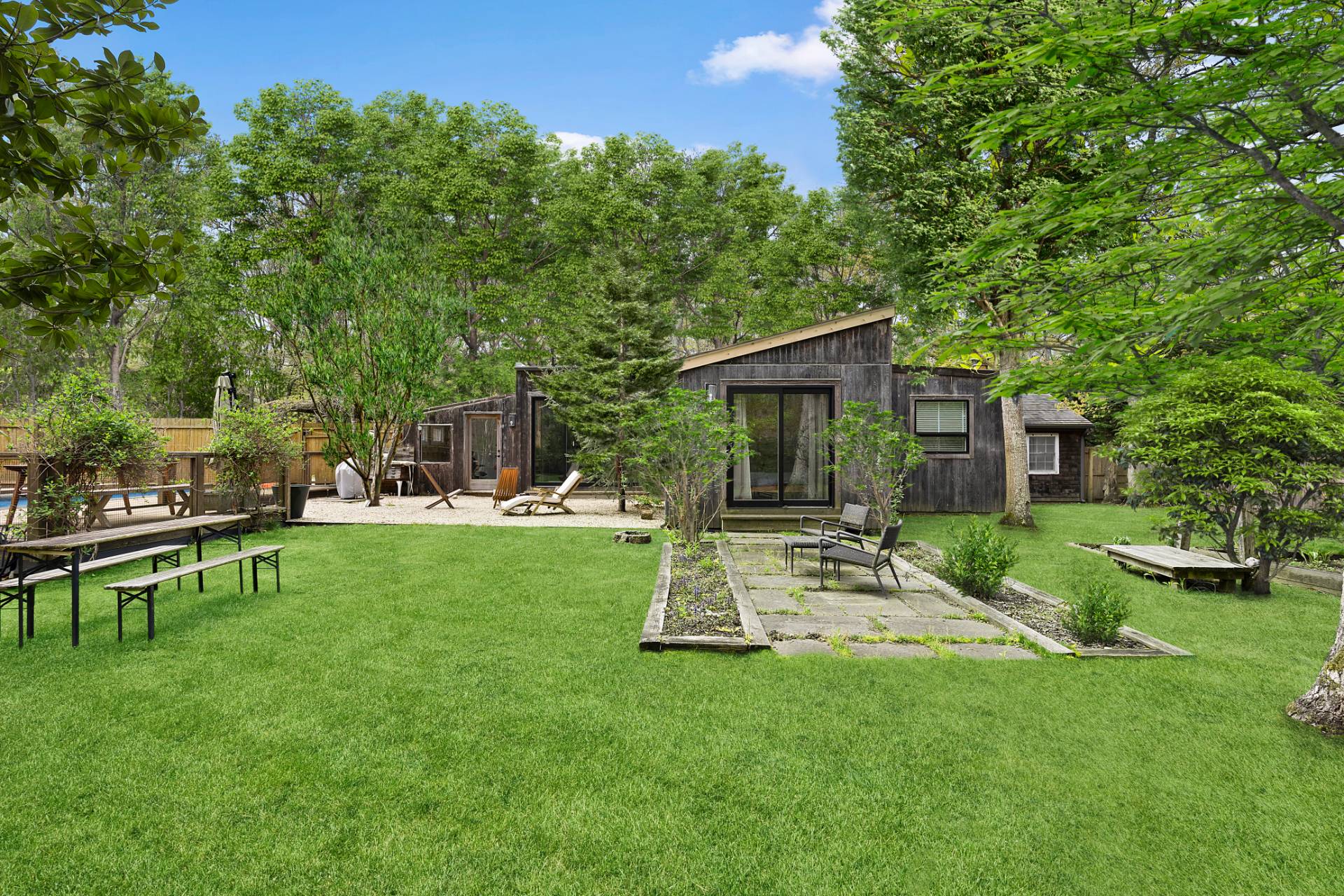 6 Beverly Road East Hampton, NY 11937 - Photo 11 of 12 a view of a house with a yard and sitting area