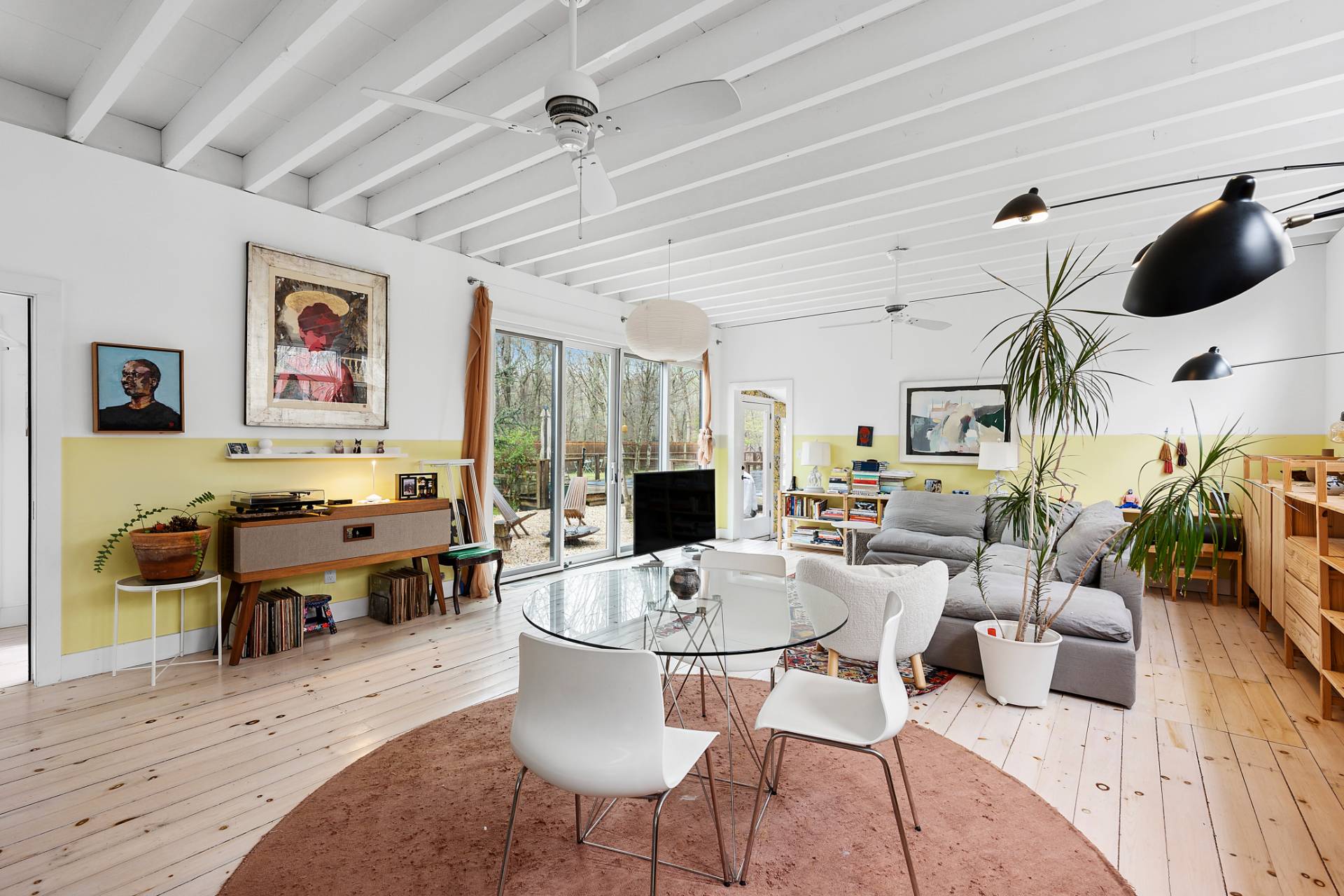 6 Beverly Road East Hampton, NY 11937 - Photo 2 of 12 a living room with furniture and a flat screen tv