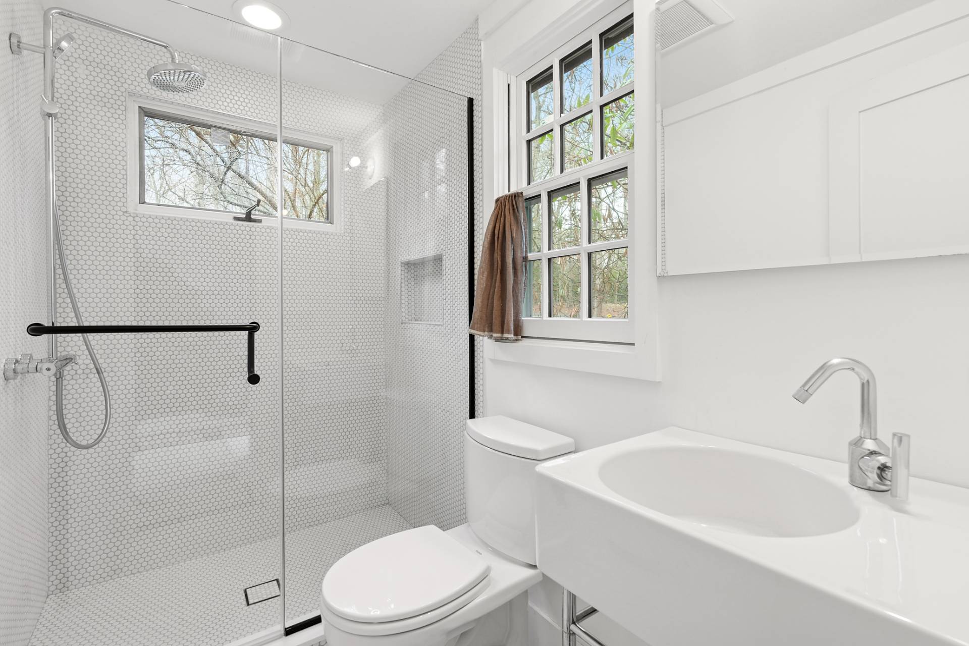 6 Beverly Road East Hampton, NY 11937 - Photo 5 of 12 a bathroom with a sink toilet and shower
