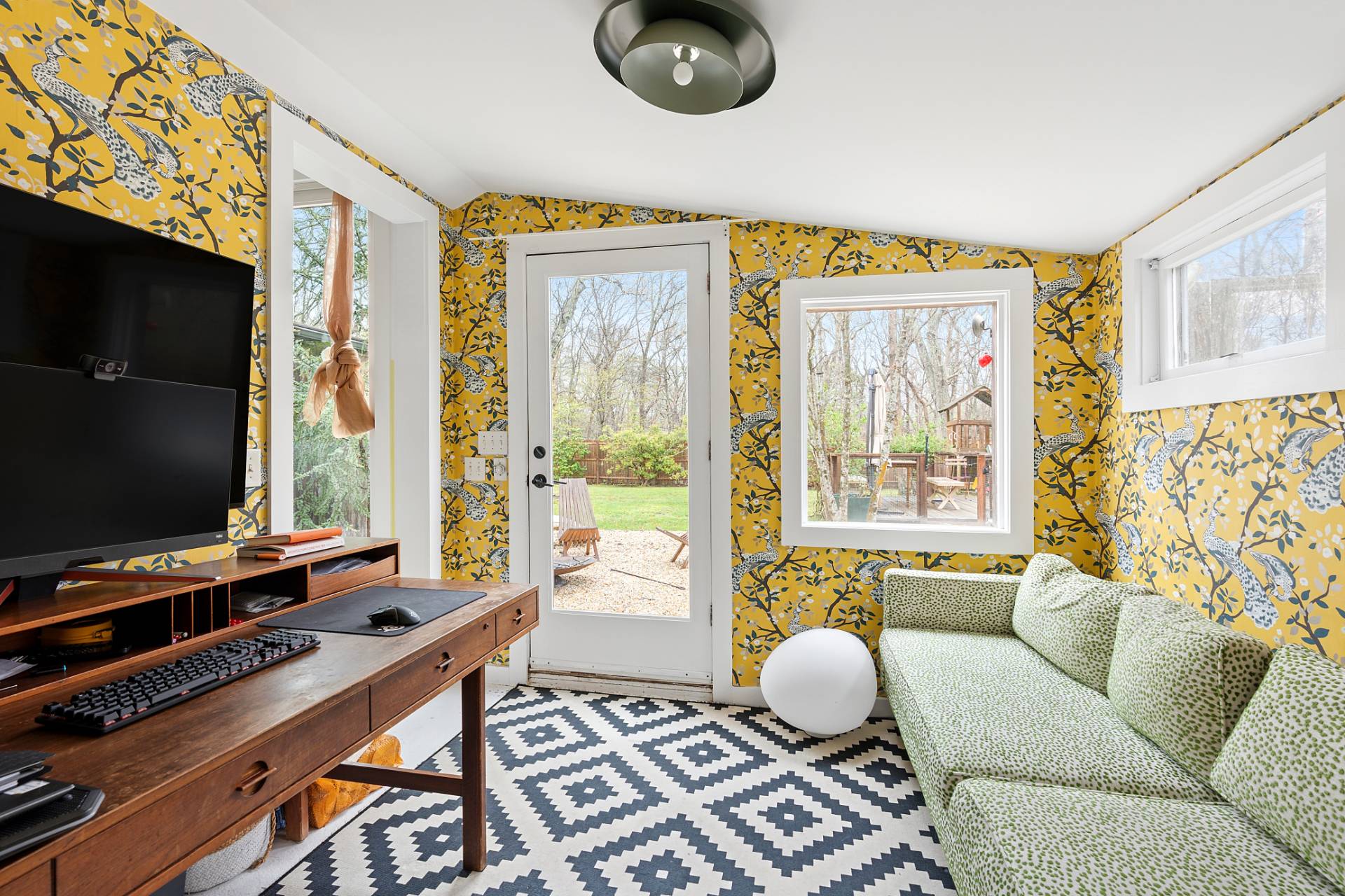 6 Beverly Road East Hampton, NY 11937 - Photo 6 of 12 a living room with furniture and a flat screen tv