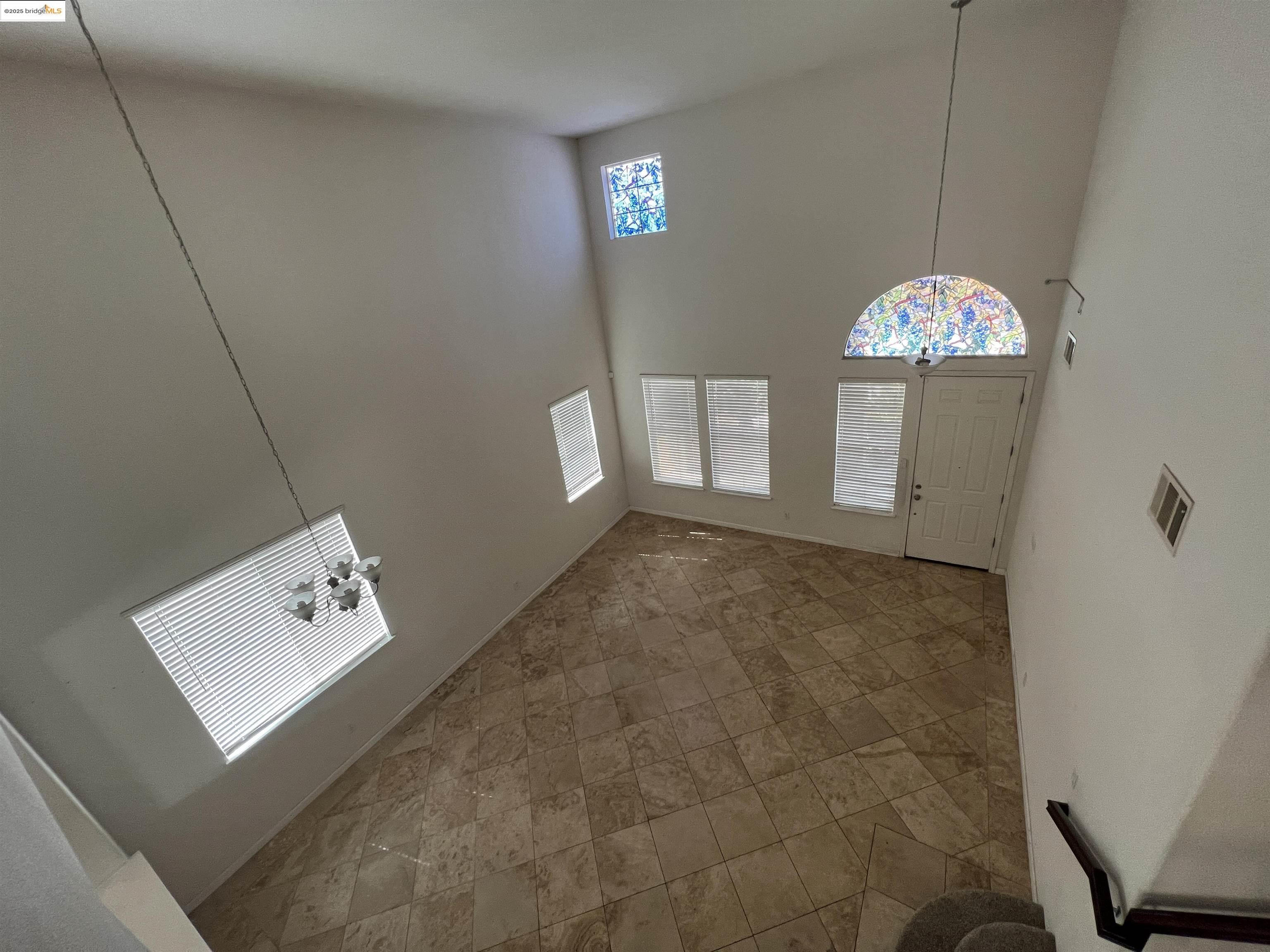 74 Vella Circle Oakley, CA 94561 - Photo 11 of 15 a view of a hallway to a livingroom with furniture
