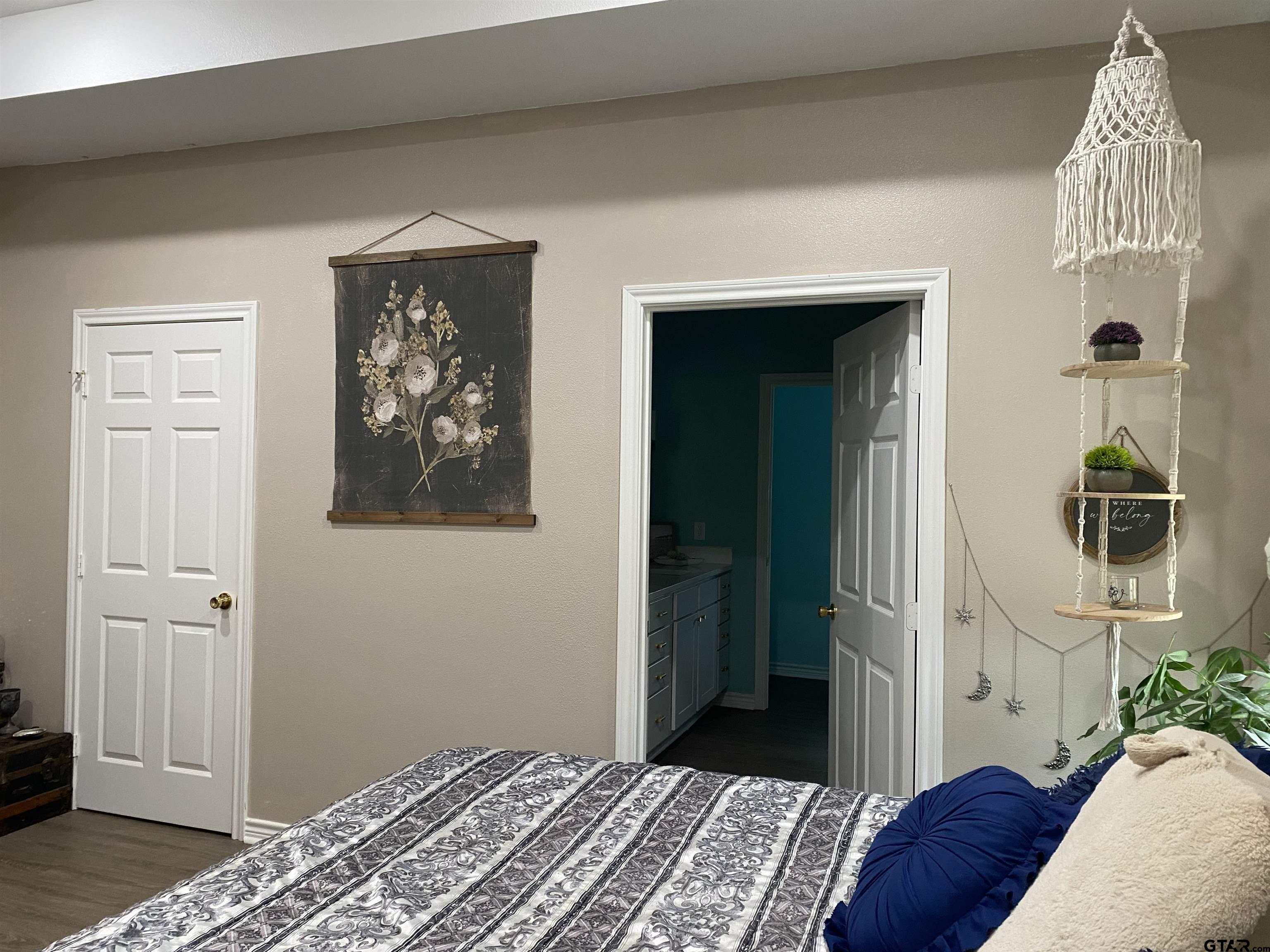 14965 Turtle Crk Rnch Road Flint, TX 75762 - Photo 13 of 22 a bedroom with a bed and a window