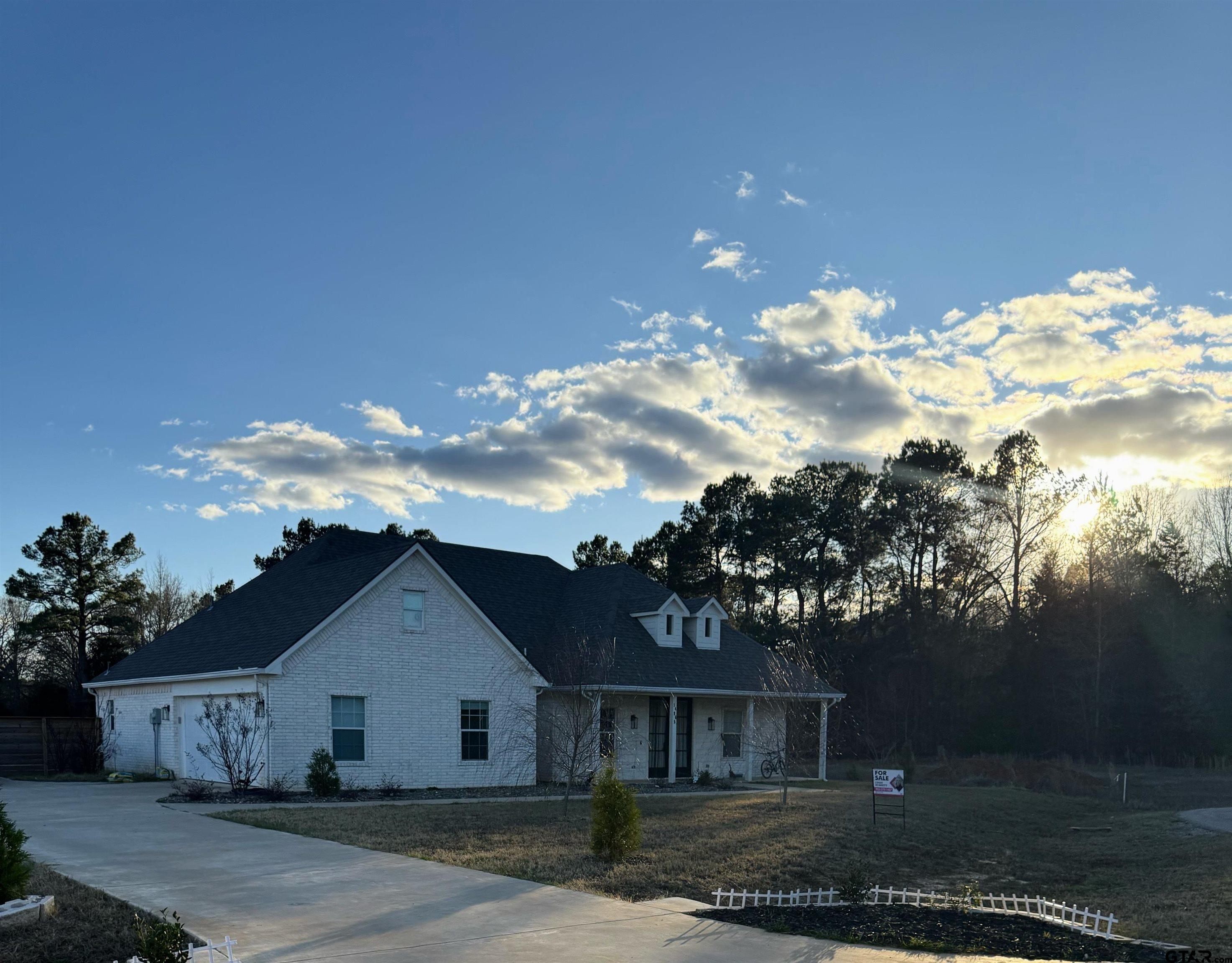 14965 Turtle Crk Rnch Road Flint, TX 75762 - Photo 3 of 22 a front view of a house with a yard