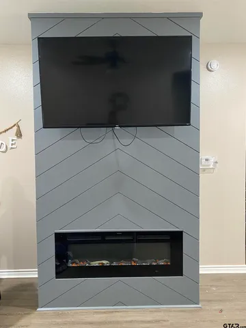 a living room with a fireplace