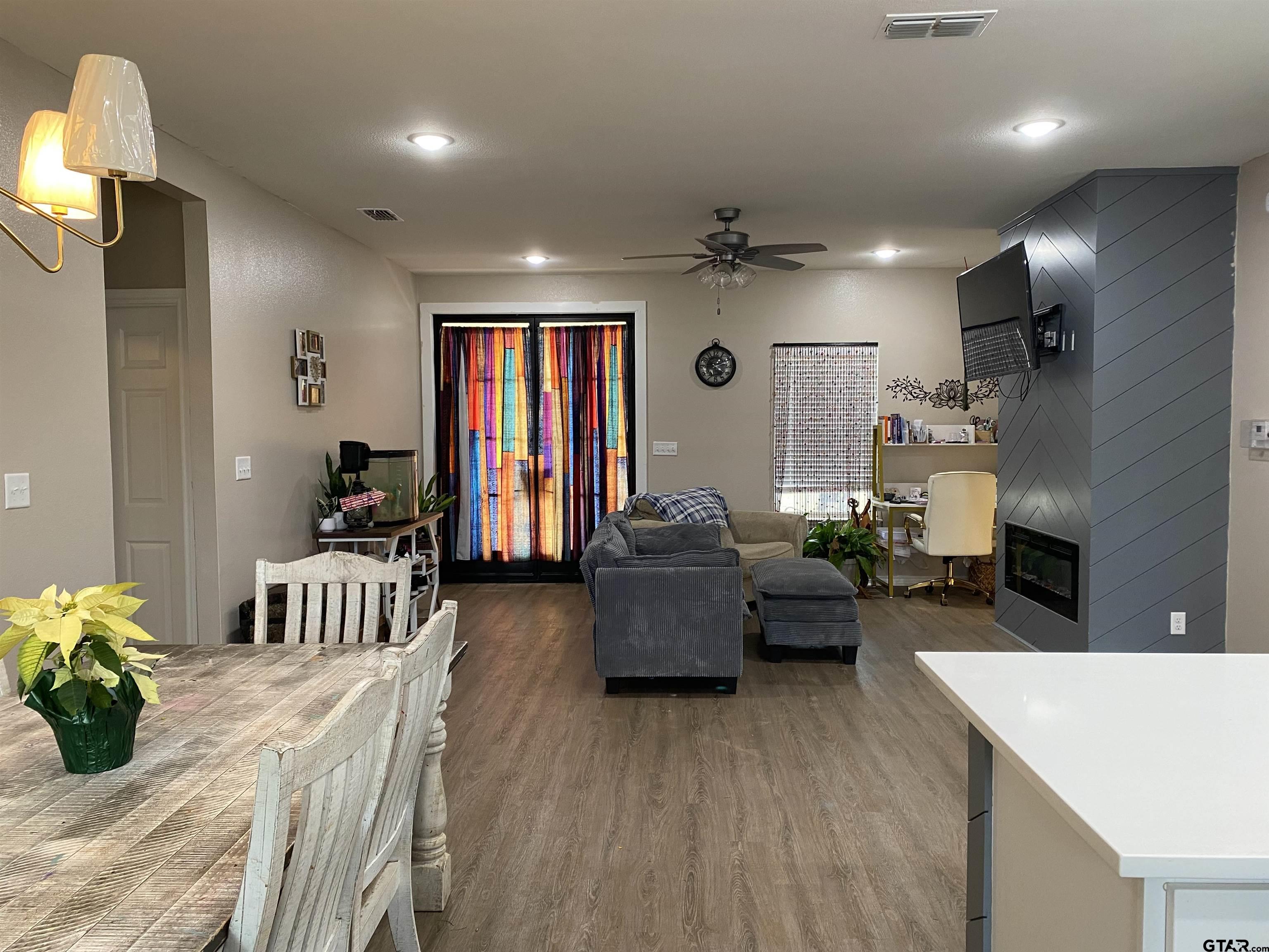 14965 Turtle Crk Rnch Road Flint, TX 75762 - Photo 10 of 22 a living room with furniture and a wooden floor