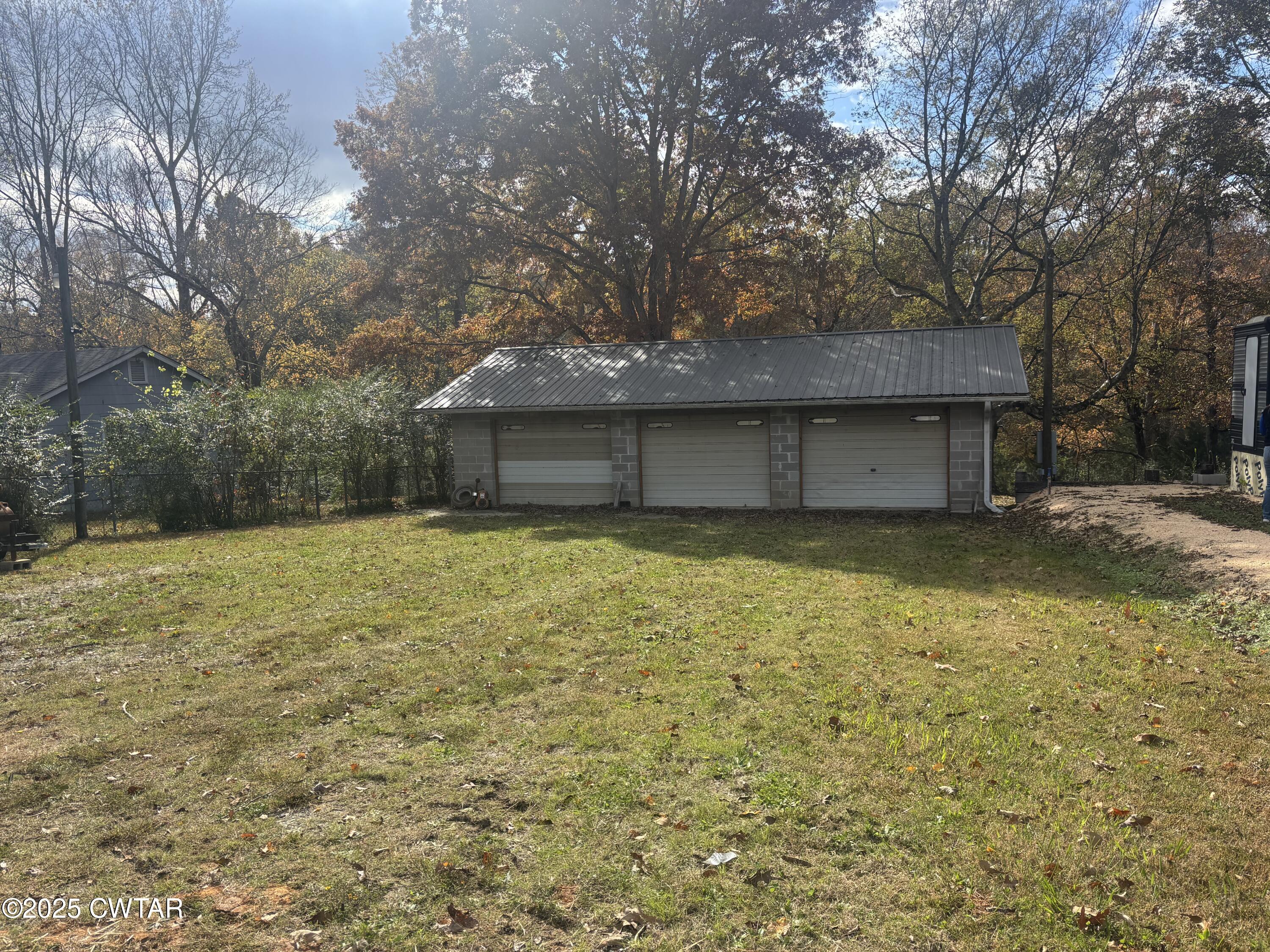 2672 Haney School Road Bath Springs, TN 38311 - Photo 2 of 2 a house view with a outdoor space