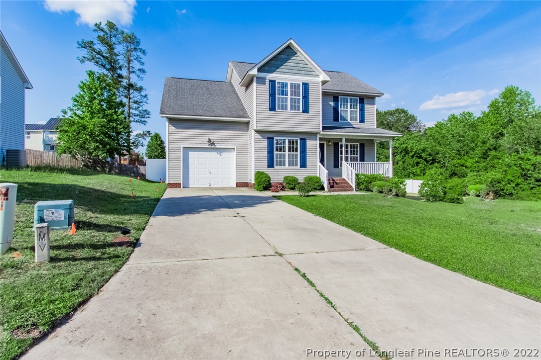 147 Boston Harbor Cameron, NC 28326 - Photo 1 of 27 a front view of house with yard and green space