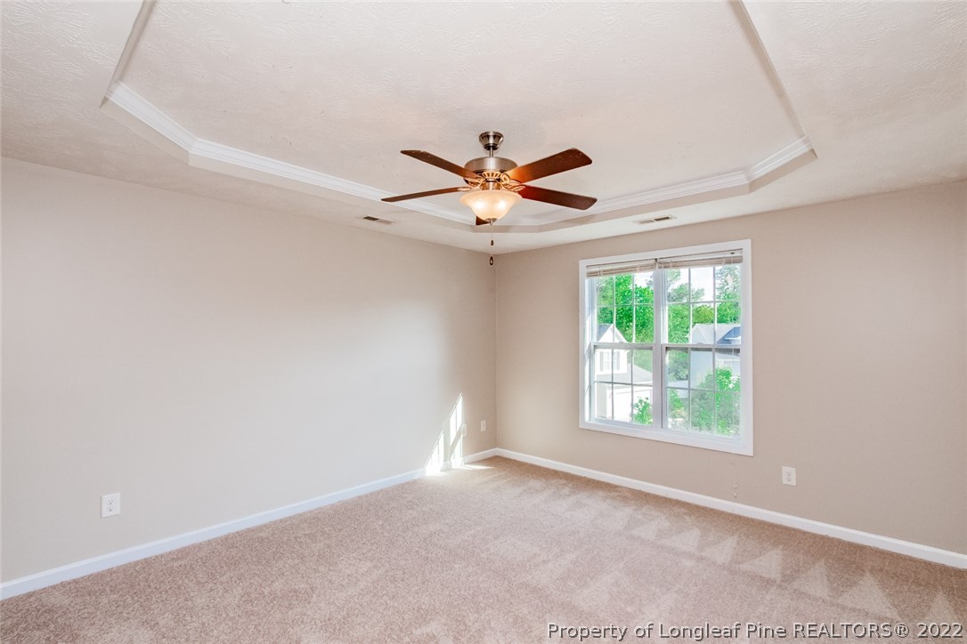 147 Boston Harbor Cameron, NC 28326 - Photo 15 of 27 an empty room with window and ceiling fan