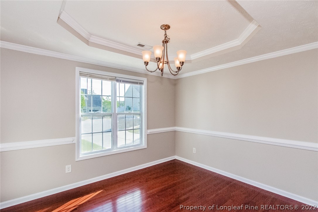 147 Boston Harbor Cameron, NC 28326 - Photo 10 of 27 wooden floor in an empty room with a window