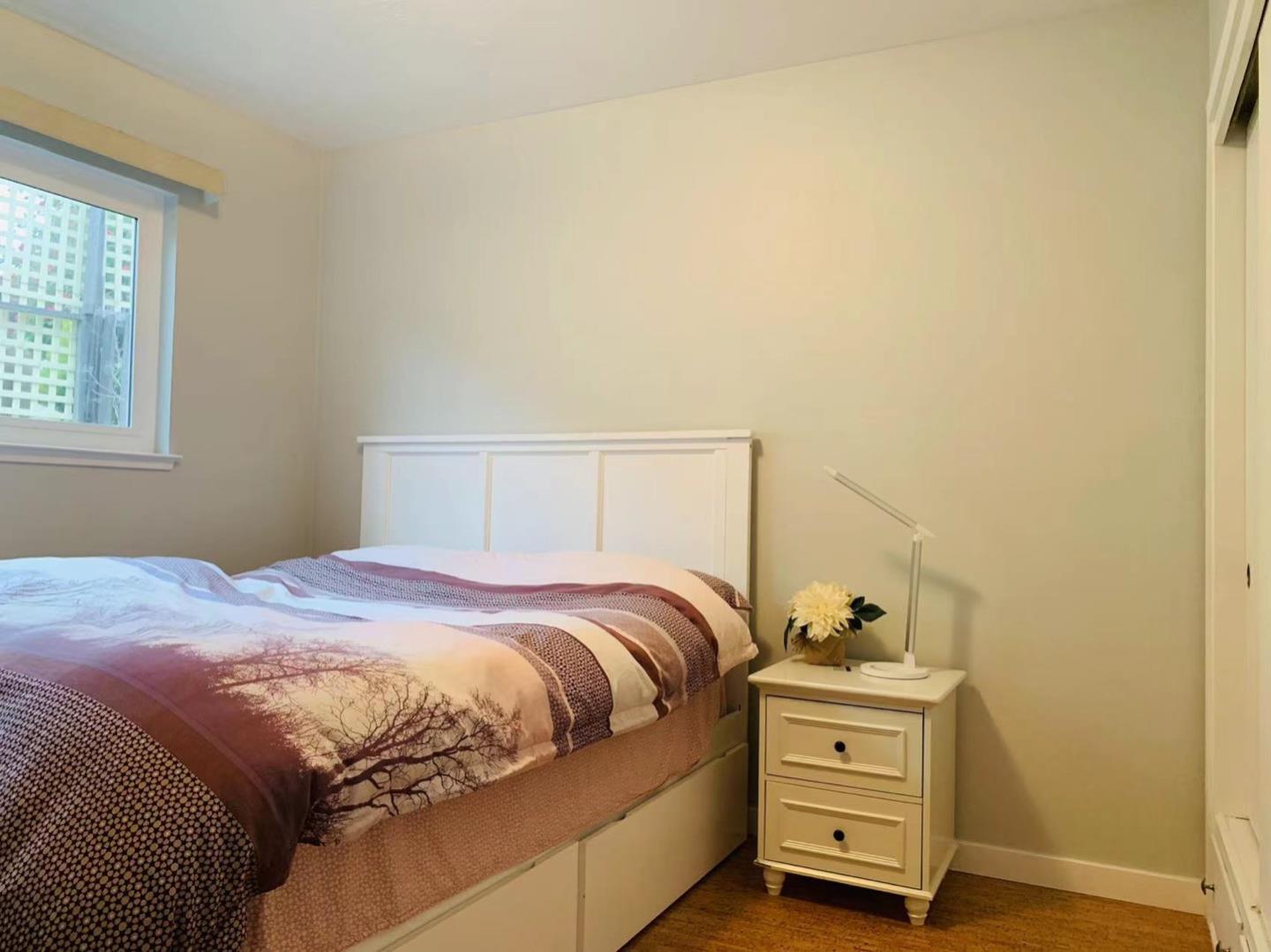 3513 Hillcrest Drive Belmont, CA 94002 - Photo 11 of 18 a bedroom with a bed and two night stand