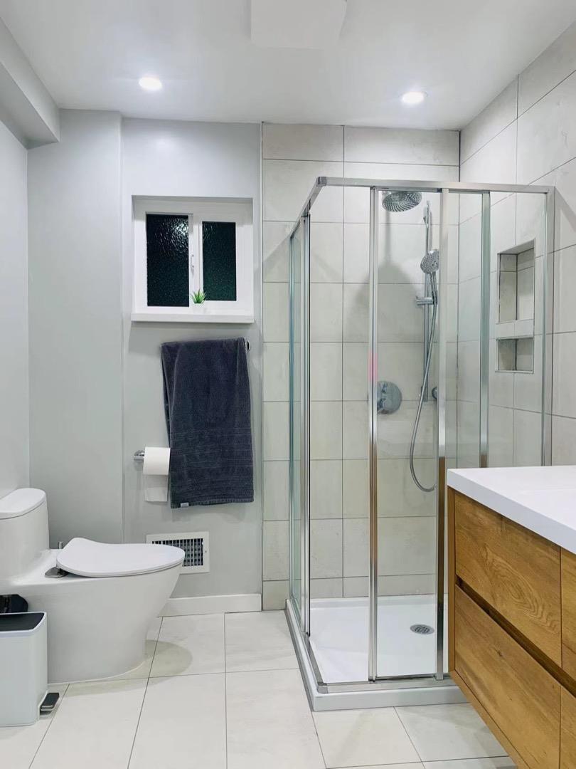 3513 Hillcrest Drive Belmont, CA 94002 - Photo 13 of 18 a bathroom with a toilet a sink and shower