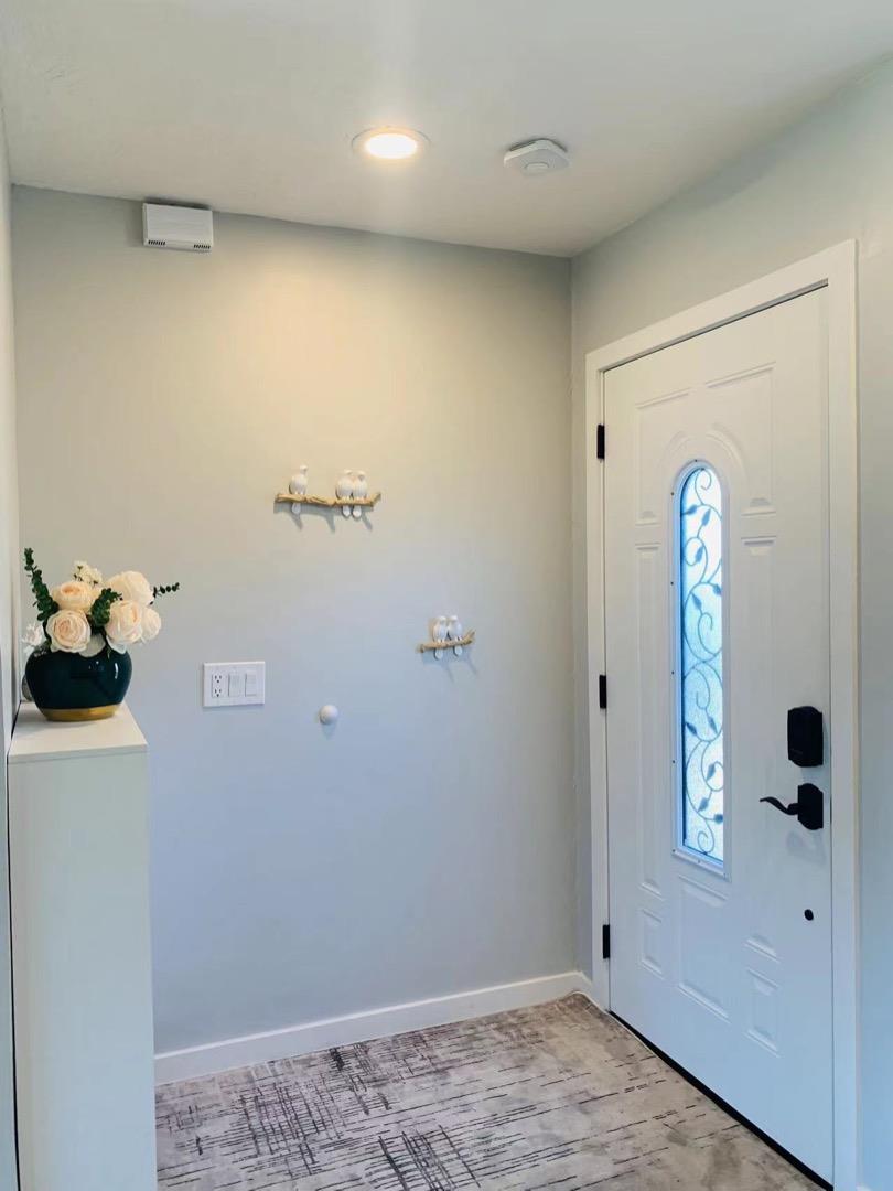 3513 Hillcrest Drive Belmont, CA 94002 - Photo 15 of 18 a view of a hallway to room with wooden floor