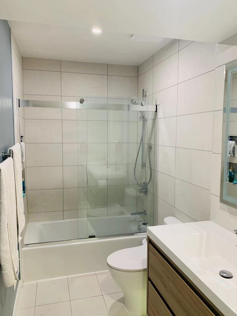 3513 Hillcrest Drive Belmont, CA 94002 - Photo 16 of 18 a bathroom with a shower and a sink