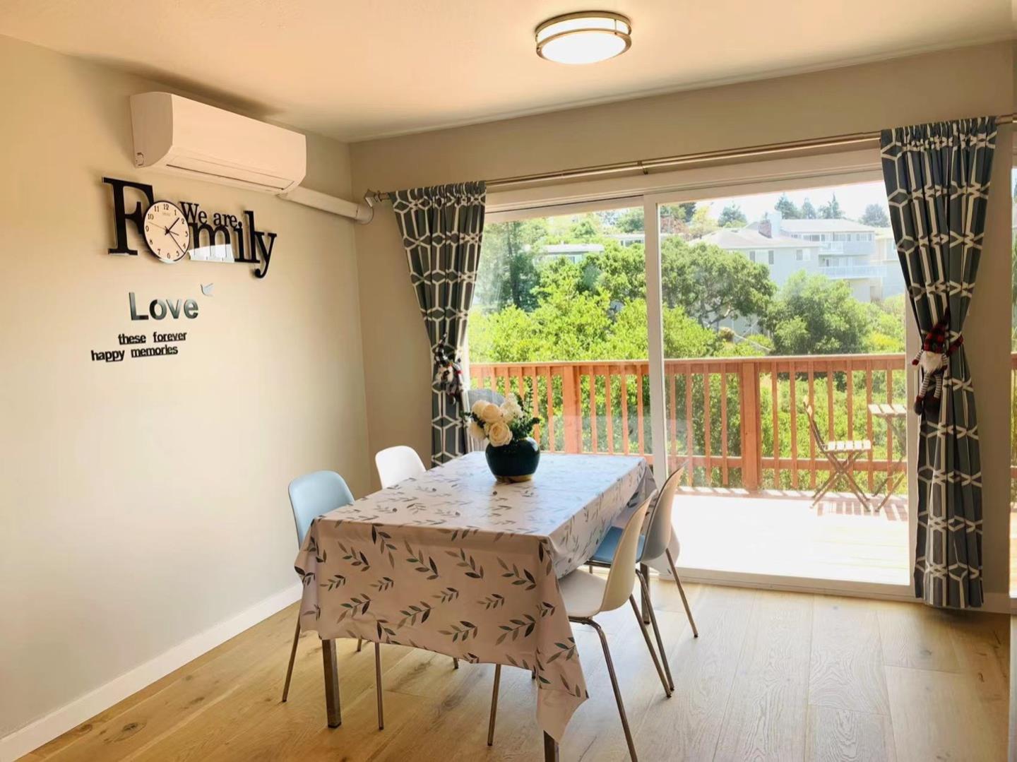 3513 Hillcrest Drive Belmont, CA 94002 - Photo 5 of 18 a view of a dining room with furniture window and wooden floor