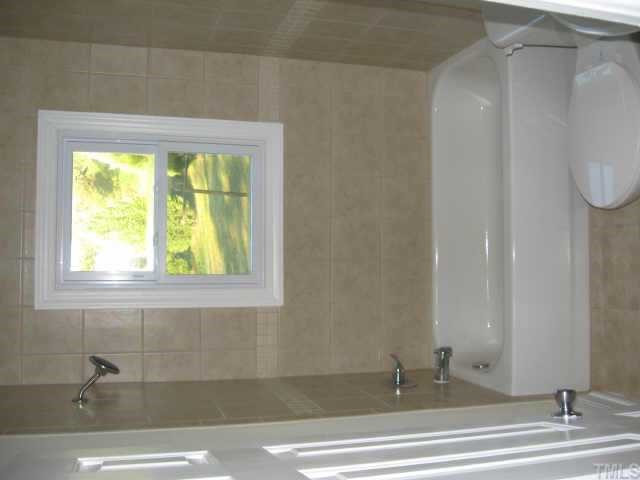 801 Colleton Road Raleigh, NC 27610 - Photo 9 of 12 Wonderful all new bathroom with ceramic tile Other