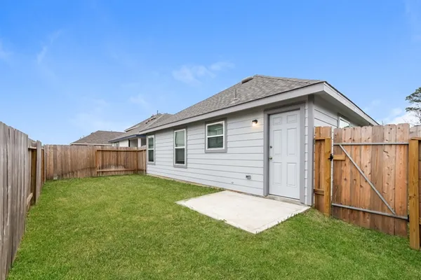 a view of a backyard with a garden