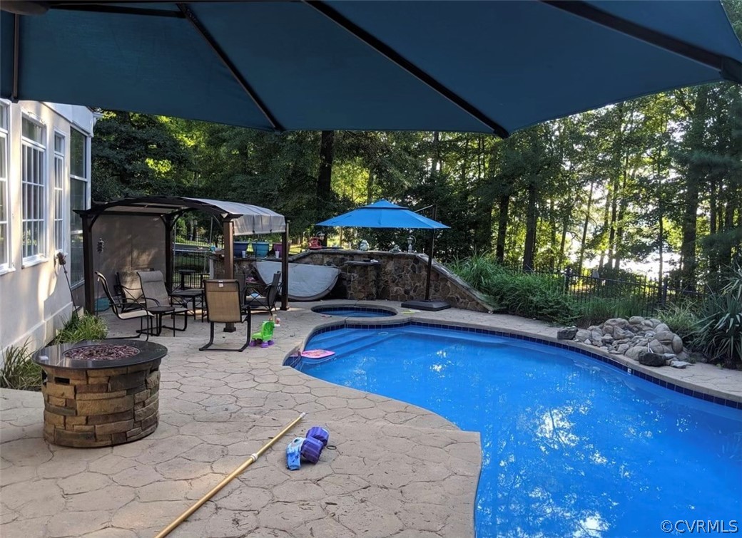 13701 Sunrise Bluff Road Midlothian, VA 23112 - Photo 5 of 48 Summertime! Gorgeous pool, hot tub and water view!