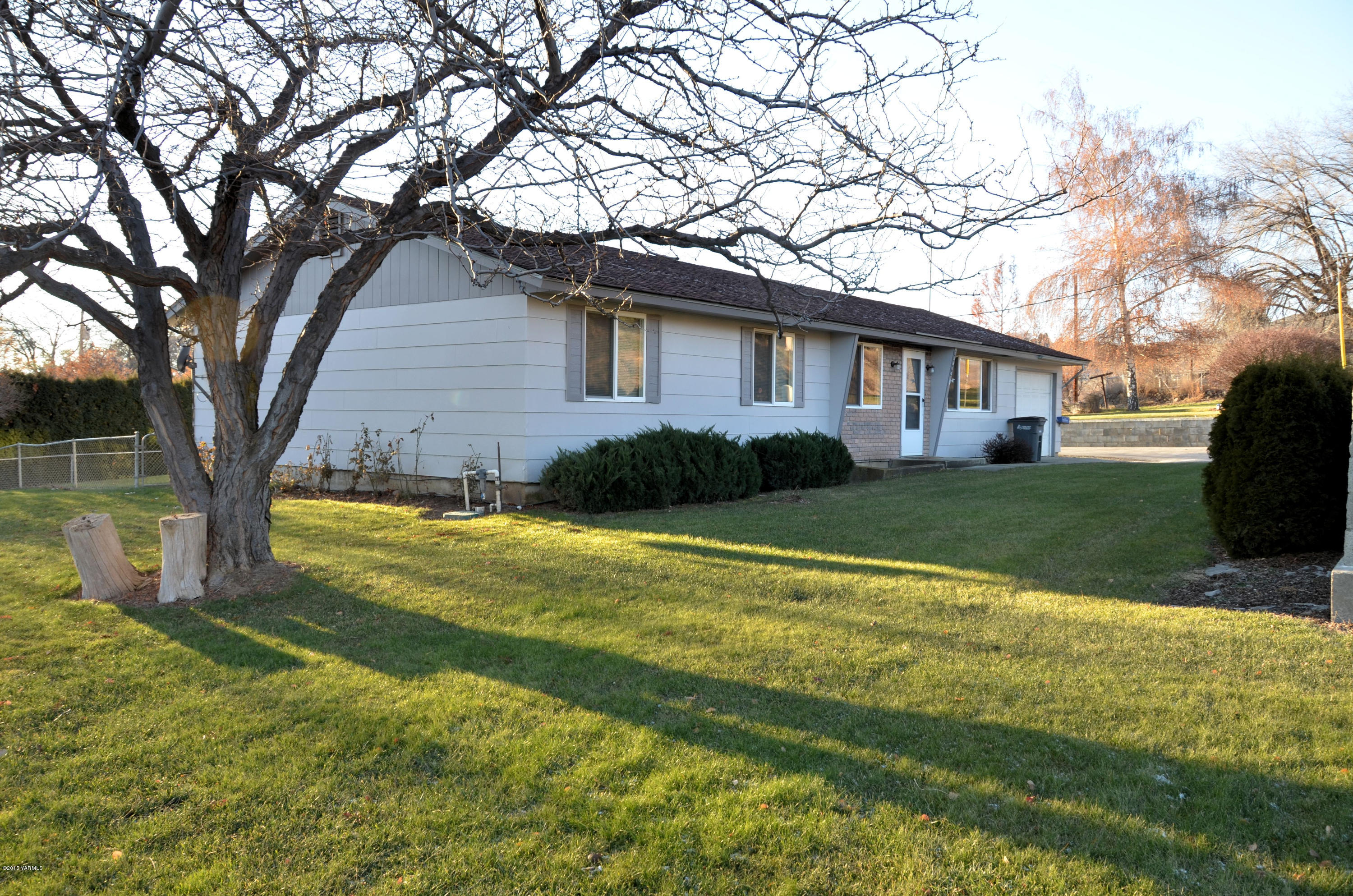 10814 Summitview Road Yakima, WA 98908 - Photo 2 of 16 a view of a house with a yard