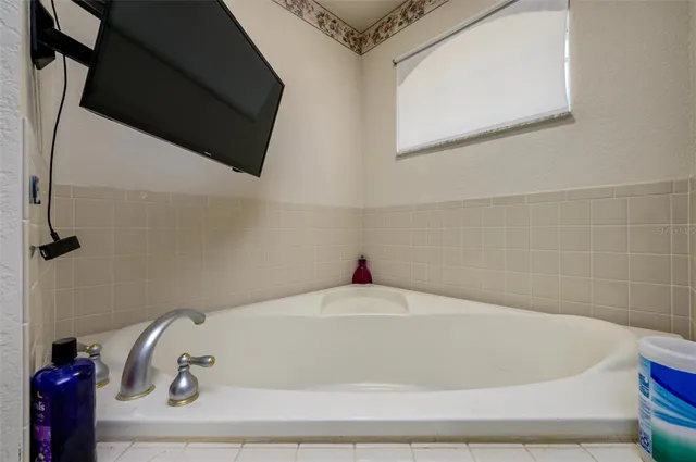 a bathroom with a bathtub