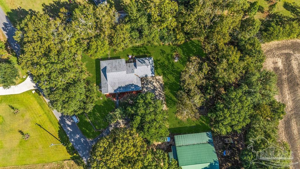8240 Tidwell Road Pace, FL 32571 - Photo 41 of 41 an aerial view of a house with a yard
