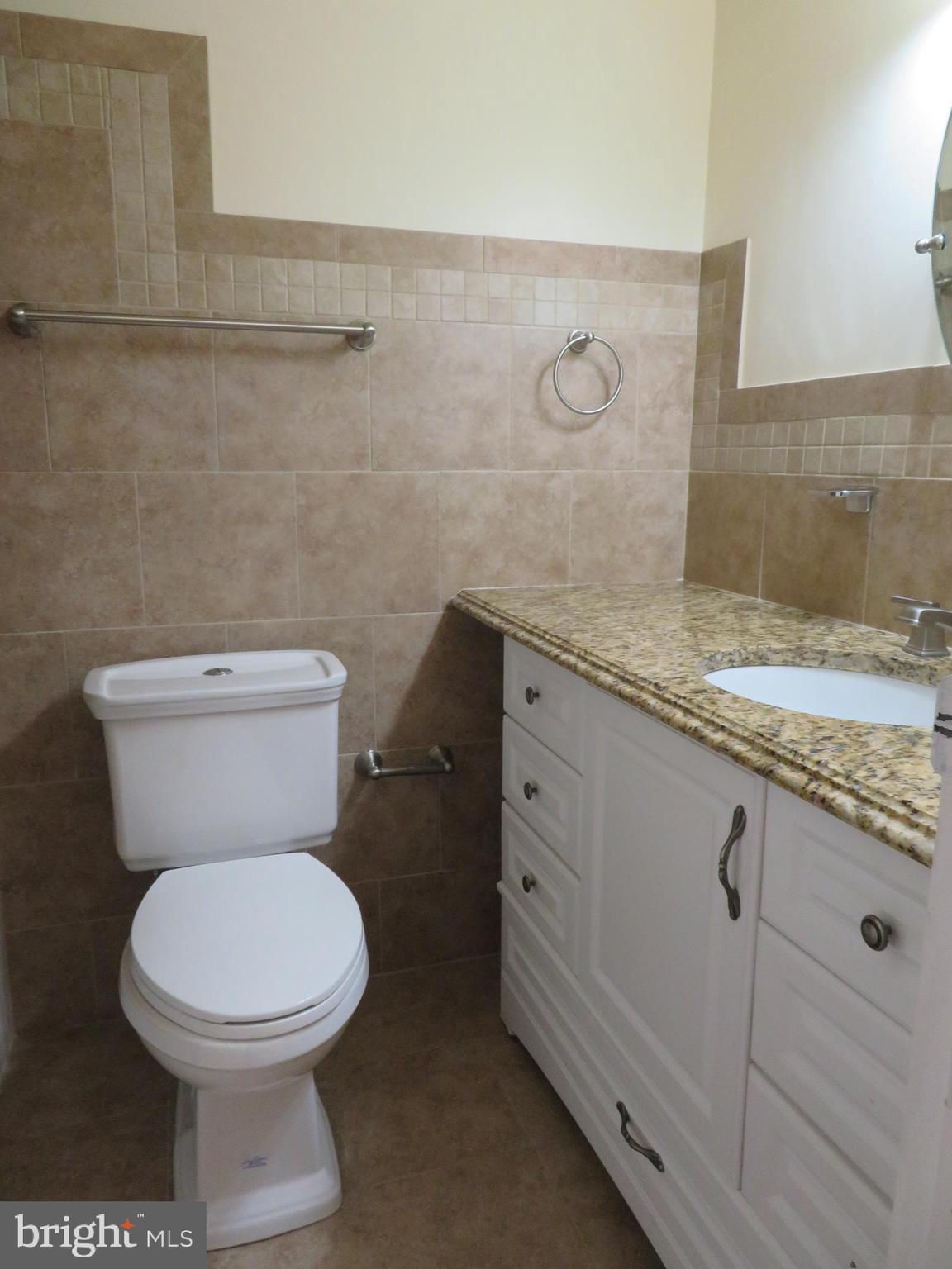 3742 Bel Pre Road, Unit 11 Silver Spring, MD 20906 - Photo 11 of 16 New Countertop, Flooring, Cabinets and Toilet