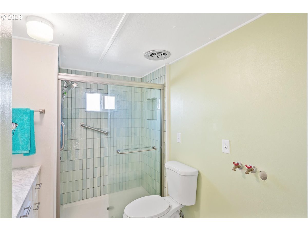 1418 Pine Street, Unit 7 Silverton, OR 97381 - Photo 18 of 27 a bathroom with a shower