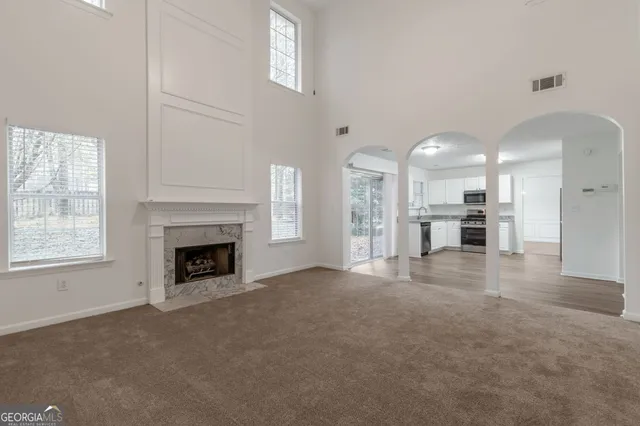 a view of a livingroom with a fireplace