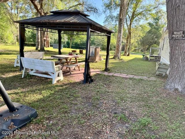 11340 Southwest 28th Way Webster, FL 33597 - Photo 32 of 38 This is a great place to have breakfast and enjoy your own land.