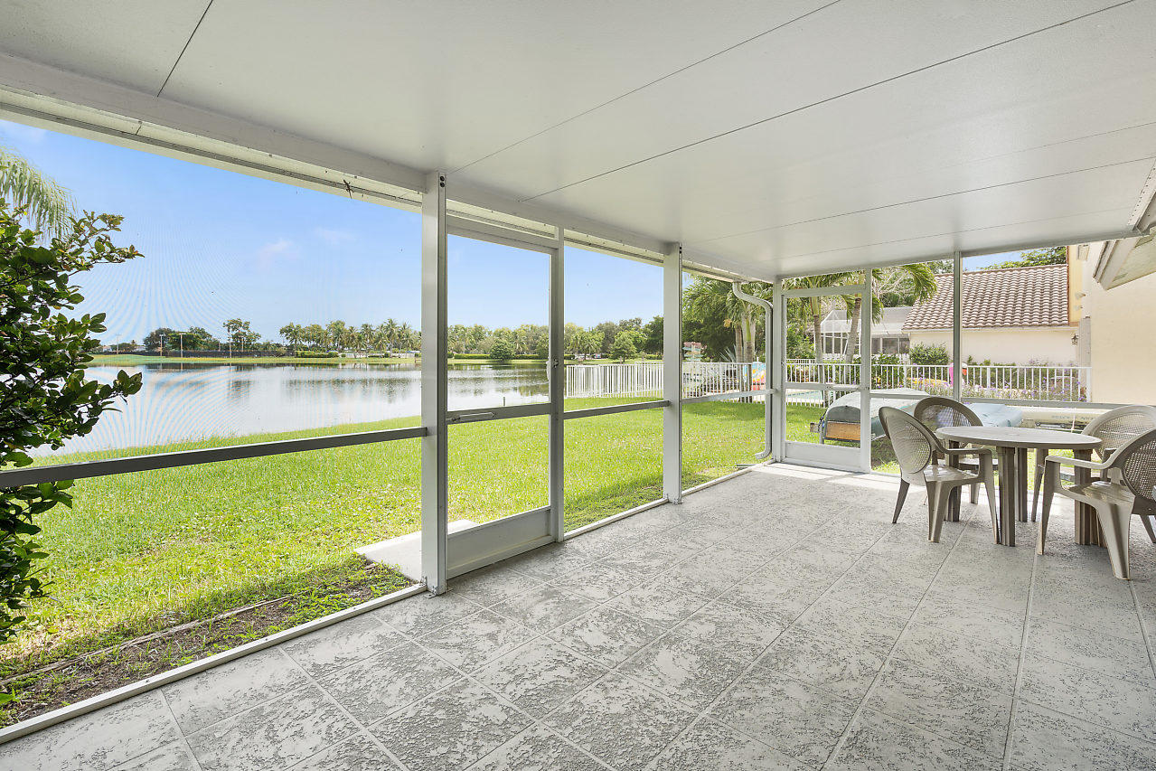 7283 Shell Ridge Terrace Lake Worth, FL 33467 - Photo 20 of 32 a view of outdoor space with seating area