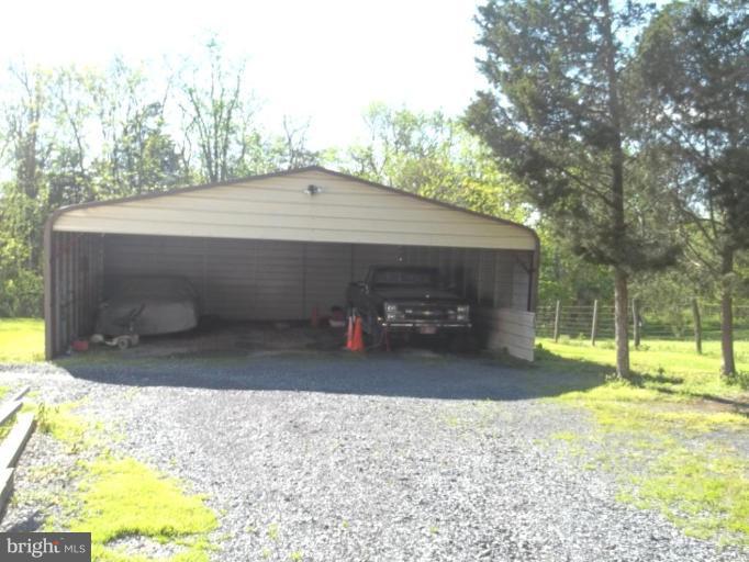 641 Co Rte 4/1 Kearneysville, WV 25430 - Photo 2 of 29 a view of a house with backyard and trees