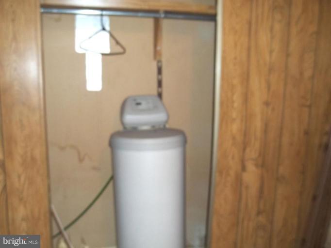 641 Co Rte 4/1 Kearneysville, WV 25430 - Photo 13 of 29 a bathroom with a shower curtain and a sink