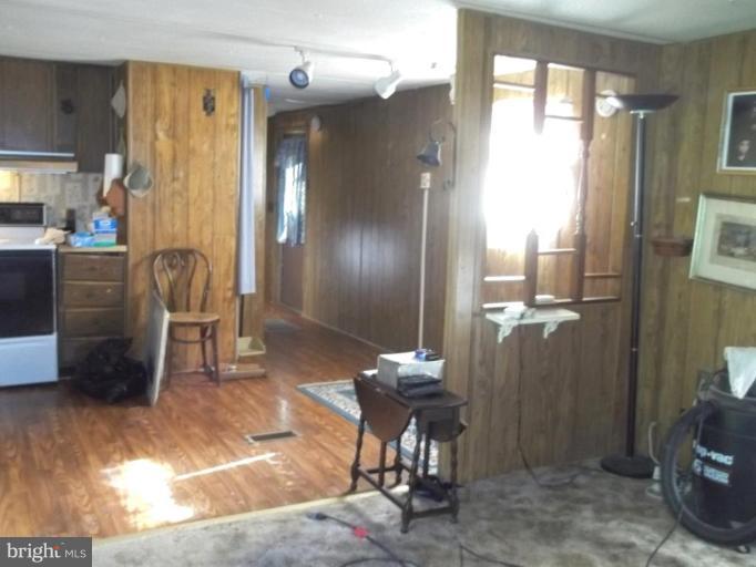 641 Co Rte 4/1 Kearneysville, WV 25430 - Photo 23 of 29 a view of a hallway with furniture and a livingroom view