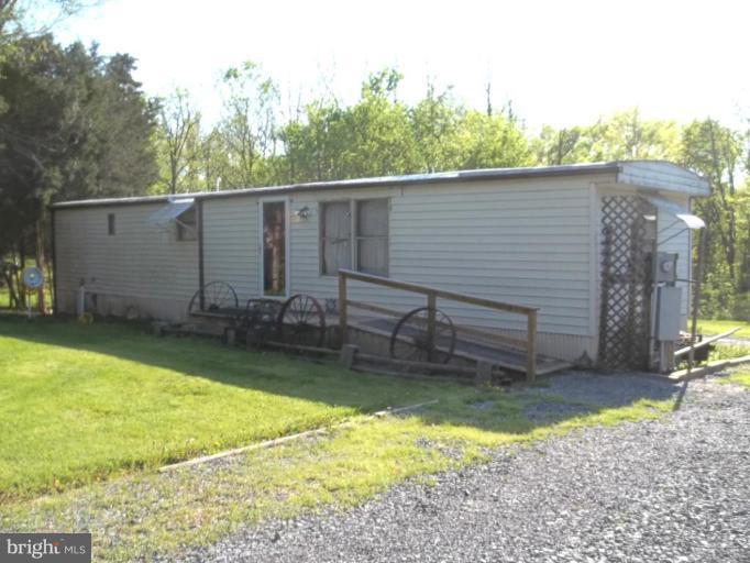 641 Co Rte 4/1 Kearneysville, WV 25430 - Photo 29 of 29 a view of a backyard with a large tree