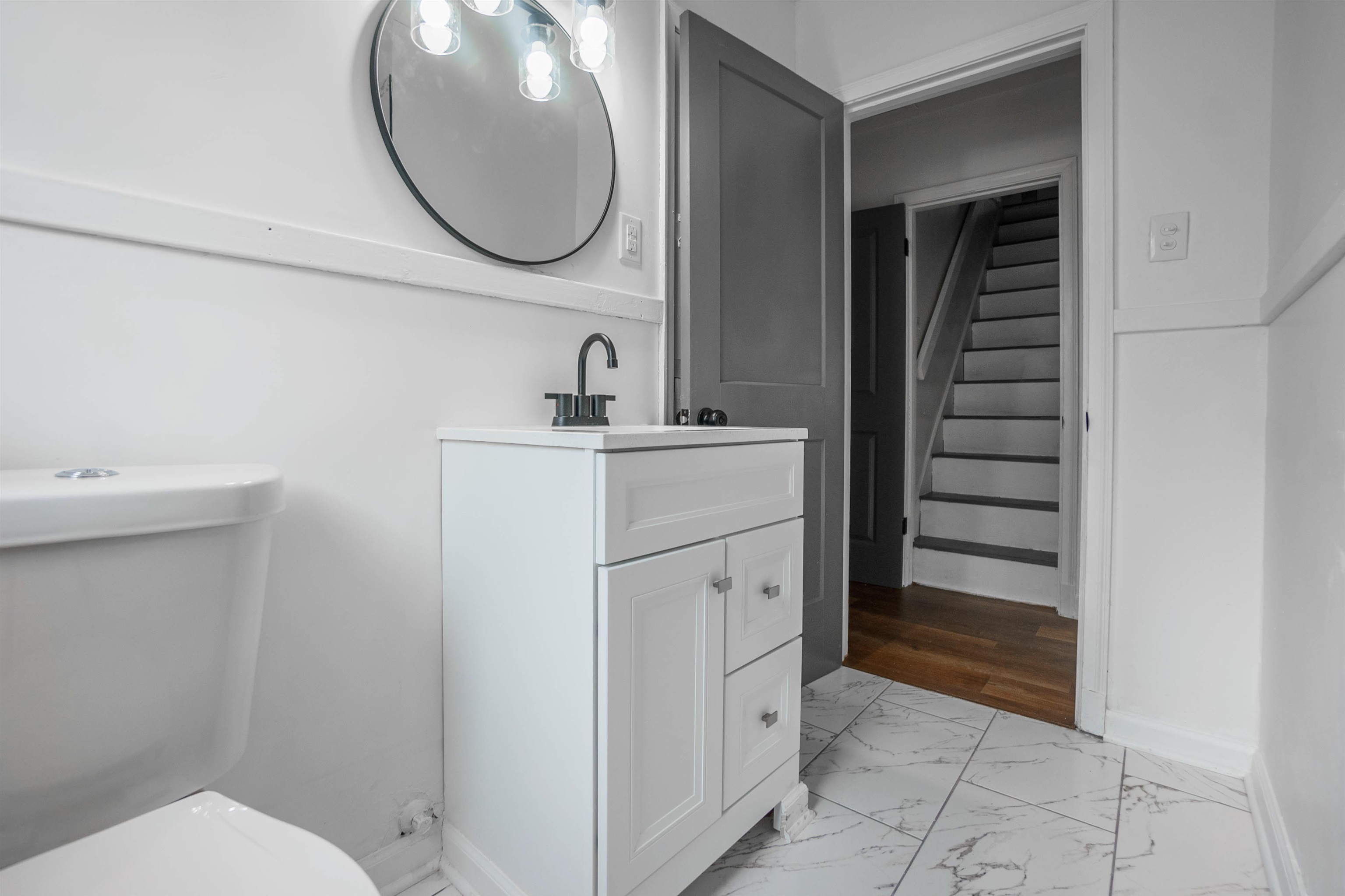 1069 Railton Road Memphis, TN 38111 - Photo 15 of 17 a bathroom with a sink and a mirror