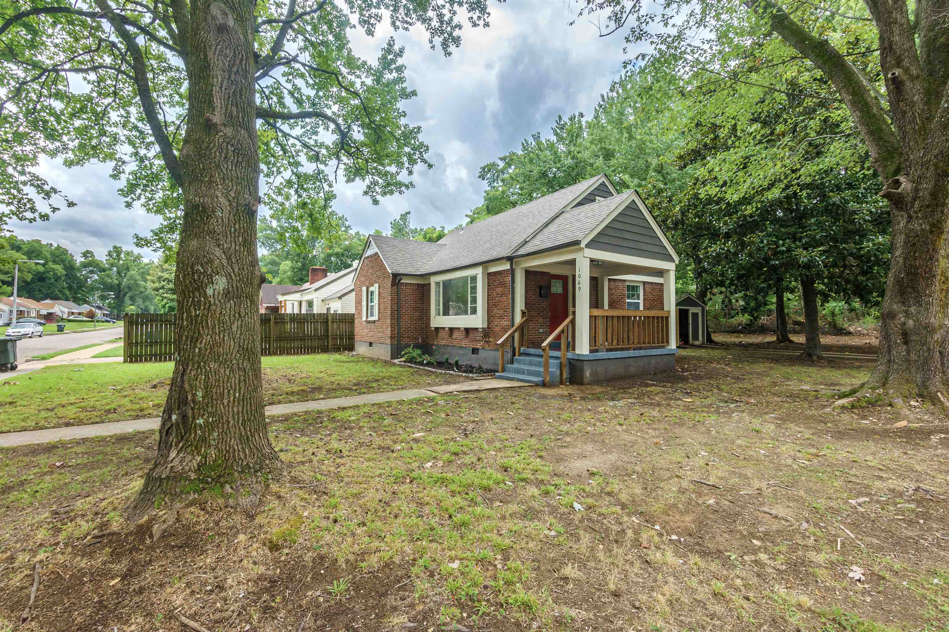 1069 Railton Road Memphis, TN 38111 - Photo 17 of 17 a view of a house with a yard