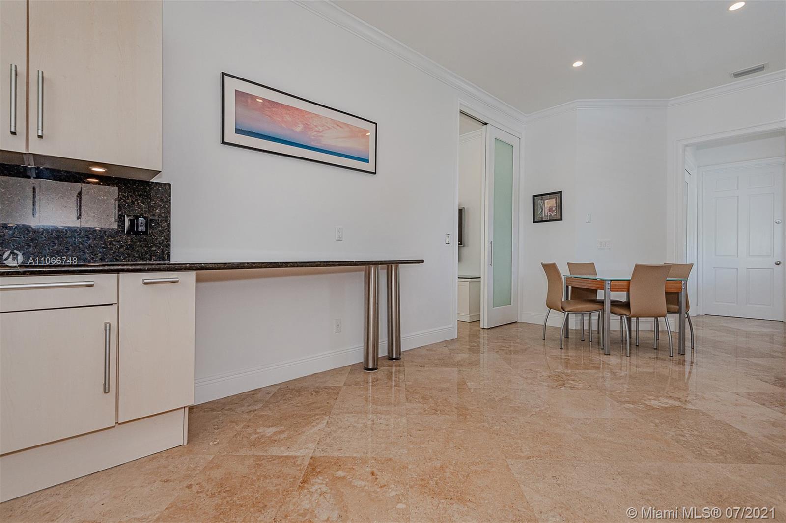 442 Woodcrest Road Key Biscayne, FL 33149 - Photo 15 of 48 a view of kitchen with furniture and cabinets