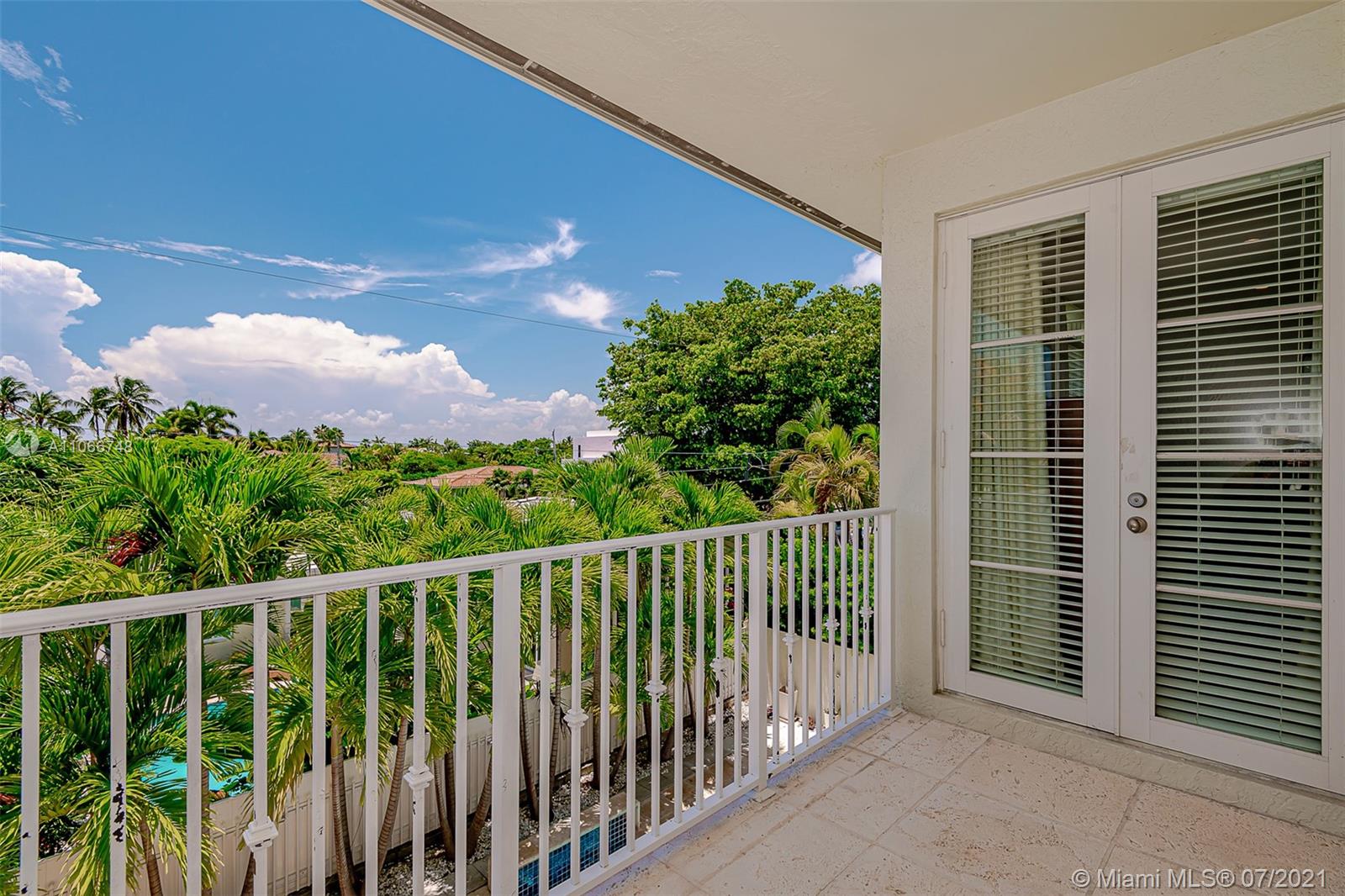442 Woodcrest Road Key Biscayne, FL 33149 - Photo 42 of 48 a view of a balcony