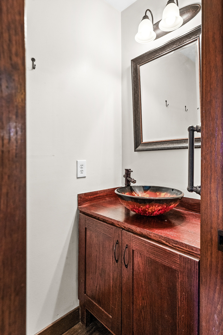 1515 Belclare Road Normal, IL 61761 - Photo 12 of 40 a bathroom with a sink and a mirror