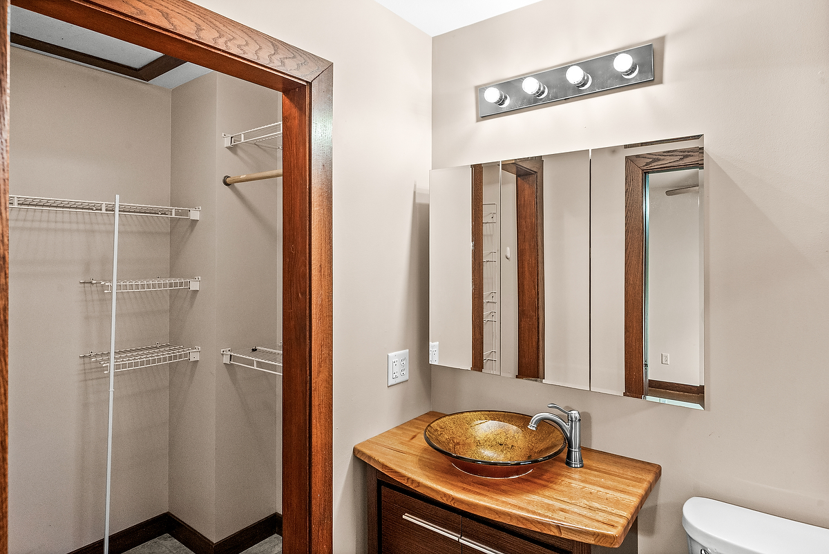 1515 Belclare Road Normal, IL 61761 - Photo 24 of 40 a bathroom with a sink toilet and shower