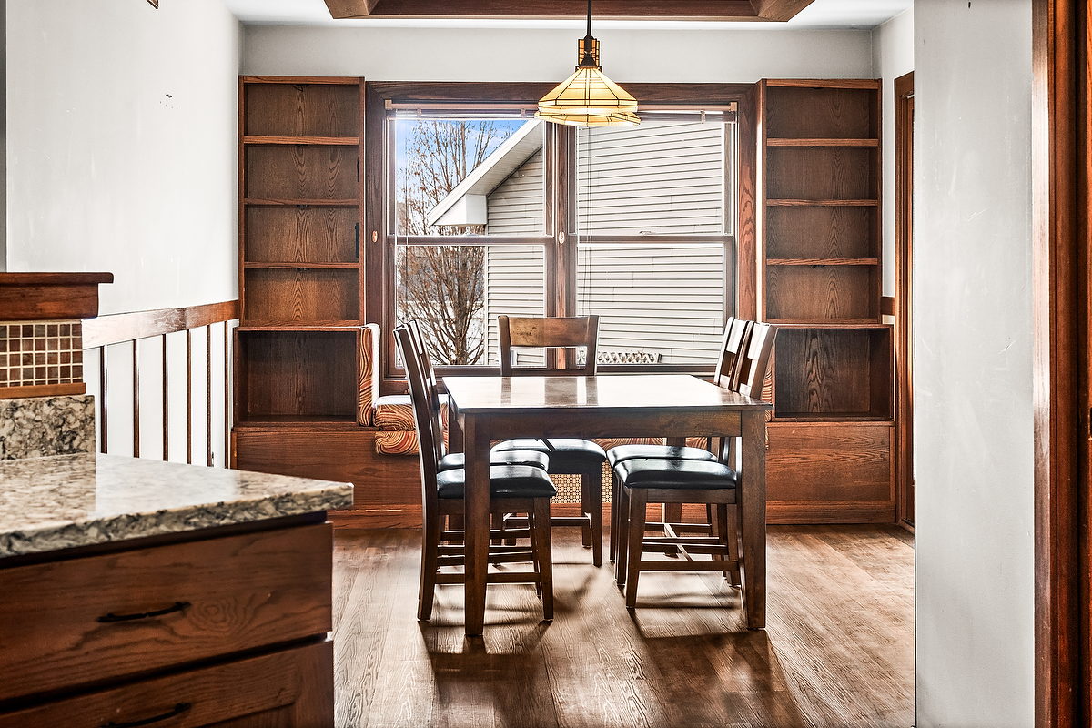 1515 Belclare Road Normal, IL 61761 - Photo 9 of 40 a view of dining room and wooden floor