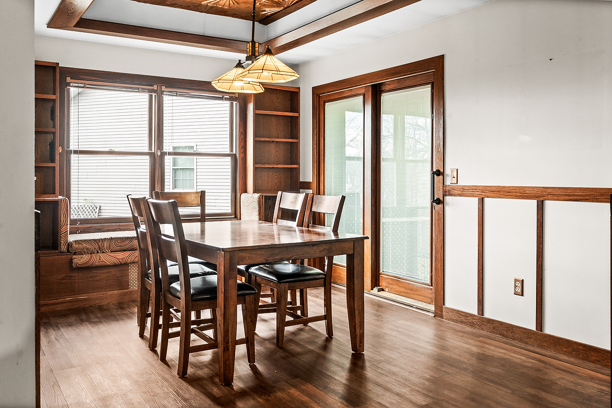 1515 Belclare Road Normal, IL 61761 - Photo 10 of 40 a view of a dining room with furniture window and wooden floor