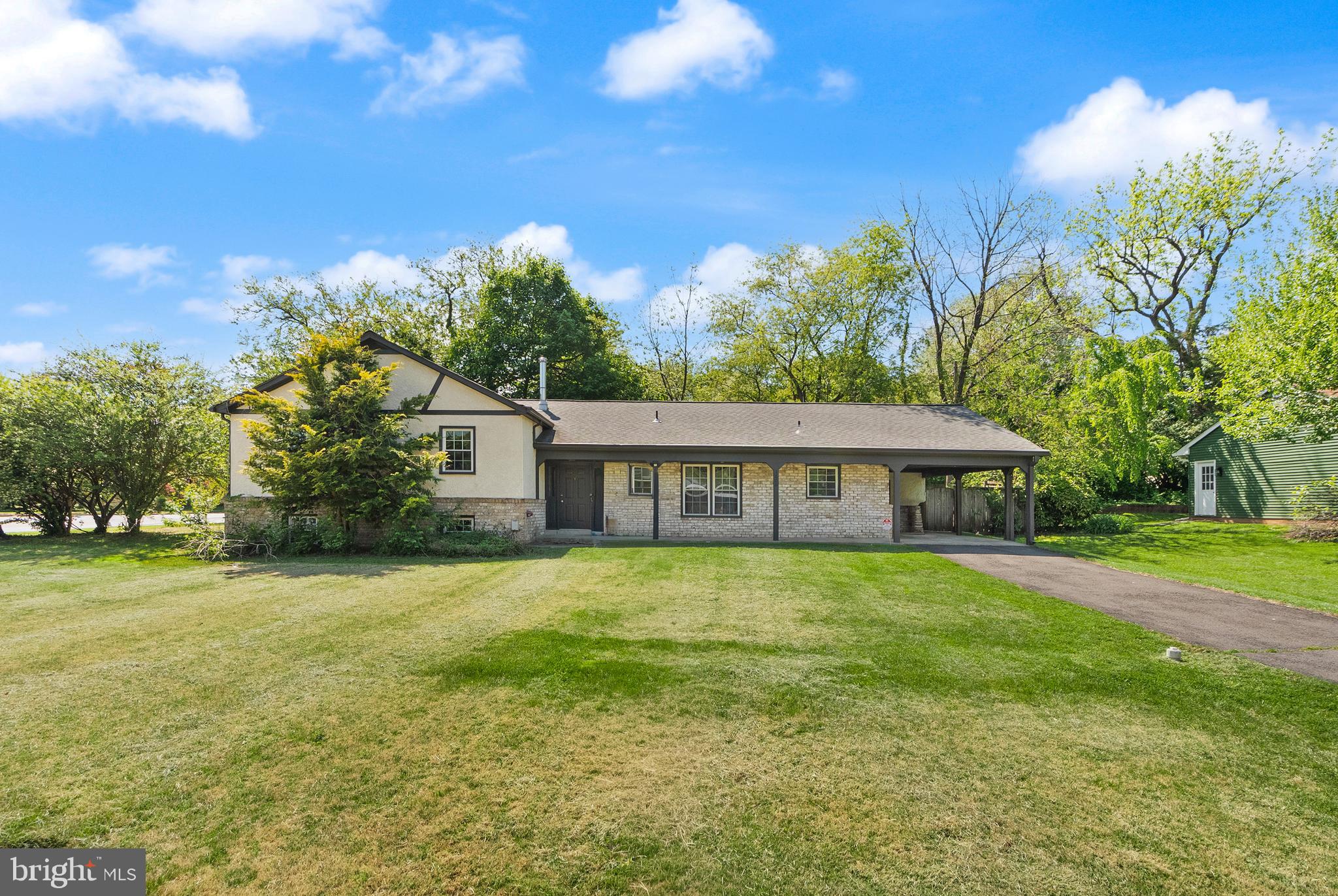 1600 Chain Bridge Road McLean, VA 22101 - Photo 2 of 22 a view of a house with a big yard