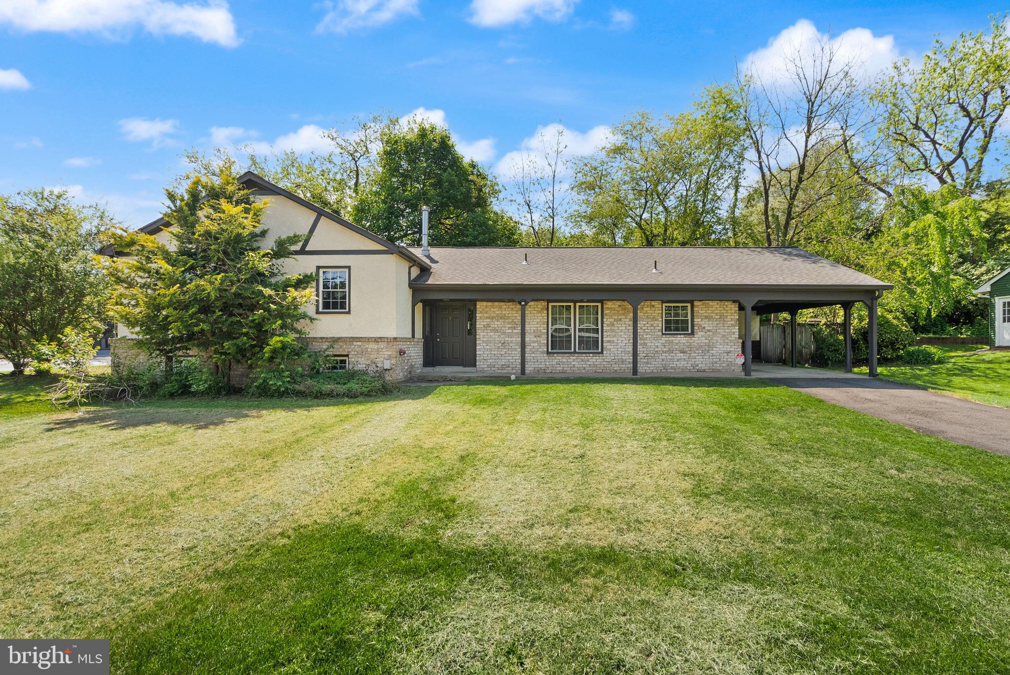 1600 Chain Bridge Road McLean, VA 22101 - Photo 3 of 22 a view of a house with a backyard