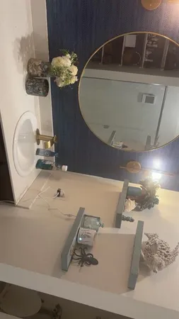 a view of walk in closet with clothes